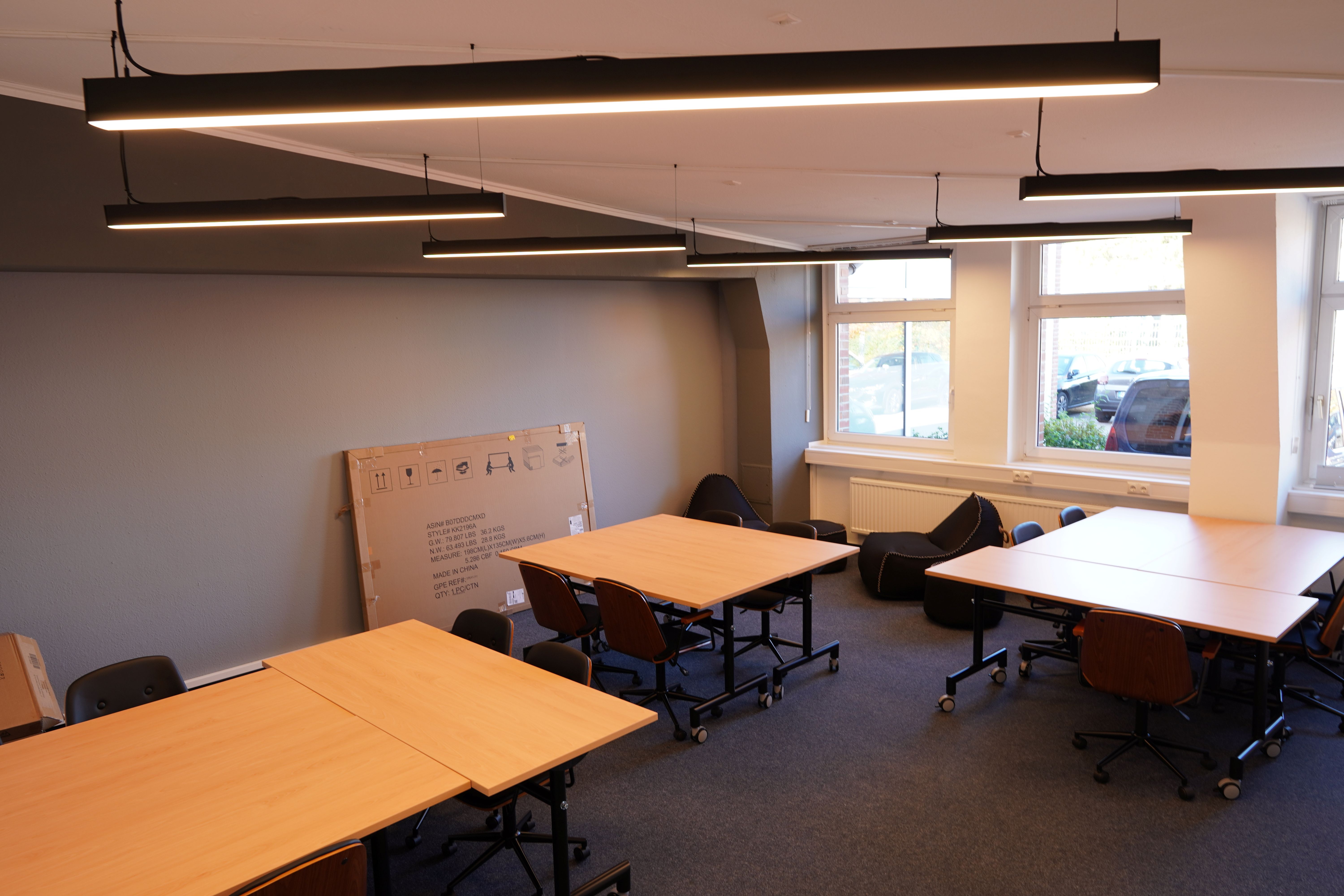 Seminarraum mit Gruppentischen